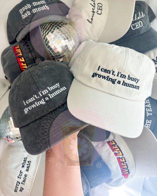 BUSY GROWING A HUMAN hat